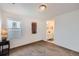 Clean bedroom with a view into the bathroom and modern decor at 154 Cortona Pl, Castle Pines, CO 80108