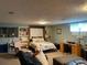 Finished basement bedroom with a murphy bed and workspace at 12505 N 3Rd St, Parker, CO 80134