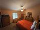 Bedroom with a double bed, dresser, and ceiling fan at 12505 N 3Rd St, Parker, CO 80134