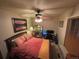 Bright bedroom with a double bed, ceiling fan, and window at 12505 N 3Rd St, Parker, CO 80134