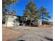 House exterior showcasing a two-car garage and landscaping at 12505 N 3Rd St, Parker, CO 80134