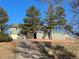 Two-story house with attached garage and long driveway at 12505 N 3Rd St, Parker, CO 80134