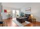 Comfortable living room with modern furnishings and sliding glass doors leading to the outdoor patio at 8112 Gray Ct # 394, Arvada, CO 80003