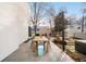 Backyard patio featuring outdoor dining, barbeque area, and elegant landscaping at 5401 E Dakota Ave # 3, Denver, CO 80246