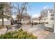 Inviting backyard space featuring a patio with outdoor furniture and a well-maintained landscape at 5401 E Dakota Ave # 3, Denver, CO 80246