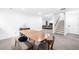 Finished basement featuring neutral carpet, a wooden table and a staircase at 5401 E Dakota Ave # 3, Denver, CO 80246