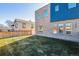 Backyard with green grass and a modern exterior at 3430 W 25Th Ave, Denver, CO 80211