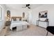 Stylishly decorated bedroom with a bed, abstract wall art, and neutral colors at 3430 W 25Th Ave, Denver, CO 80211