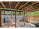 Cozy outdoor patio with brick flooring, shaded seating and wood fence. Perfect for relaxation at 64 Nome Way # A, Aurora, CO 80012