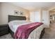 Comfortable bedroom features a spacious closet, neutral walls, and a cozy atmosphere for restful nights at 9314 Wiltshire Dr, Highlands Ranch, CO 80130