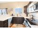 Kitchen featuring stainless steel appliances, modern countertops, and lots of natural light at 9314 Wiltshire Dr, Highlands Ranch, CO 80130