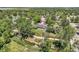 Scenic aerial view features a well-maintained home and beautifully landscaped yard with mature trees at 9146 W 89Th Ct, Broomfield, CO 80021