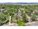 Scenic aerial view showcasing the home's serene location near a creek and green community spaces at 9146 W 89Th Ct, Broomfield, CO 80021