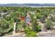 Aerial view of a property with a fenced backyard next to a stream, offering privacy and natural beauty at 9146 W 89Th Ct, Broomfield, CO 80021