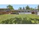 Spacious backyard featuring a covered patio perfect for outdoor entertaining and relaxation at 9146 W 89Th Ct, Broomfield, CO 80021
