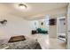 Bright finished basement with a bed, sofa, and sleek flooring, offering versatility and comfort at 9146 W 89Th Ct, Broomfield, CO 80021