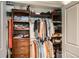 Organized walk-in closet featuring custom shelving and ample storage space at 9146 W 89Th Ct, Broomfield, CO 80021