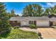 Well-maintained home featuring a brick facade, tidy landscaping, and attached two car garage at 9146 W 89Th Ct, Broomfield, CO 80021