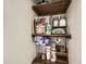 Pantry featuring wooden shelving with various pantry items on display at 9146 W 89Th Ct, Broomfield, CO 80021