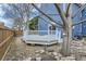 A cozy backyard deck and outdoor area, perfect for quiet evenings and enjoying the natural surroundings at 16780 E Hialeah Ave, Centennial, CO 80015
