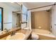 Neutral bathroom featuring a shower-tub combo with a shower curtain at 16780 E Hialeah Ave, Centennial, CO 80015