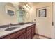 Bathroom featuring vanity and dual sinks at 4071 E 126Th Pl, Thornton, CO 80241