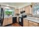 Bright kitchen features countertops, backsplash, and cabinetry at 4071 E 126Th Pl, Thornton, CO 80241