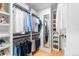 Custom walk-in closet with ample storage space for clothes, shoes, and accessories at 450 S York St, Denver, CO 80209