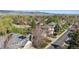 Picturesque aerial view of a neighborhood featuring well-manicured lawns, mature trees, and convenient street parking at 4059 Nevis St, Boulder, CO 80301