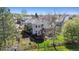 Aerial view of a private backyard with a deck, pergola, and well-maintained lawn at 4059 Nevis St, Boulder, CO 80301