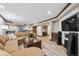 Finished basement offers open layout with a large sofa and entertainment center at 4059 Nevis St, Boulder, CO 80301