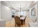 Open concept dining area with hardwood floors and lots of natural light at 4059 Nevis St, Boulder, CO 80301