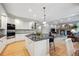 Spacious kitchen that opens to the living room, featuring stainless steel appliances and granite counters at 4059 Nevis St, Boulder, CO 80301