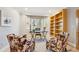 Bright office space featuring a bay window, built-in bookshelves, and unique decor at 4059 Nevis St, Boulder, CO 80301