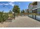 View of the raised garden beds and fenced backyard at 7201 W Asbury Pl, Lakewood, CO 80227