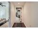 Hallway view leading to the bedroom and basement of the home at 7201 W Asbury Pl, Lakewood, CO 80227