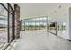 Bright, spacious room featuring floor-to-ceiling windows offering panoramic views of the outdoor landscape and a neutral color palette at 7201 W Asbury Pl, Lakewood, CO 80227