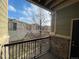 Balcony with view of surrounding buildings and trees at 17346 Nature Walk Trl # 201, Parker, CO 80134