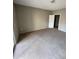 Spacious bedroom with plush carpeting and closet at 17346 Nature Walk Trl # 201, Parker, CO 80134