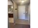 Neat entryway with tile flooring and coat rack at 17346 Nature Walk Trl # 201, Parker, CO 80134