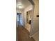 Bright hallway with access to bedrooms and bathrooms at 17346 Nature Walk Trl # 201, Parker, CO 80134