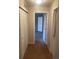 Hallway with access to bedrooms and closets at 17346 Nature Walk Trl # 201, Parker, CO 80134