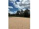 Outdoor sand volleyball court with surrounding landscape at 17346 Nature Walk Trl # 201, Parker, CO 80134