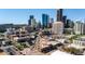 Wide aerial view of the city showcasing skyline, roads, and surrounding buildings at 2150 Curtis St, Denver, CO 80205