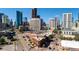Aerial shot showcasing city skyline, roads, and commercial buildings at 2150 Curtis St, Denver, CO 80205