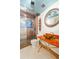 Bathroom with unique vessel sink, shower, and a view of the city at 2150 Curtis St, Denver, CO 80205