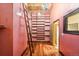 Closet with a ladder and shelves for storage space and a chandelier at 2150 Curtis St, Denver, CO 80205