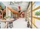 Bright living room showcasing large windows, a mosaic floor, and open space at 2150 Curtis St, Denver, CO 80205