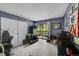 Bedroom with sliding glass doors to outdoor area and neutral carpet at 14300 E Marina Dr # 109, Aurora, CO 80014