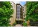 A condo building entrance features a secure entry and convenient access for residents and guests at 14300 E Marina Dr # 109, Aurora, CO 80014